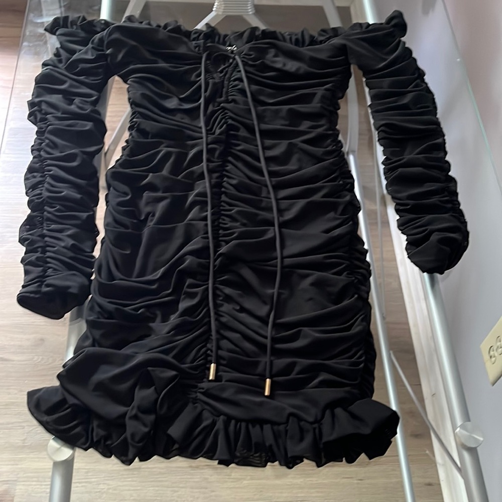 Long sleeve off the shoulder black mini dress